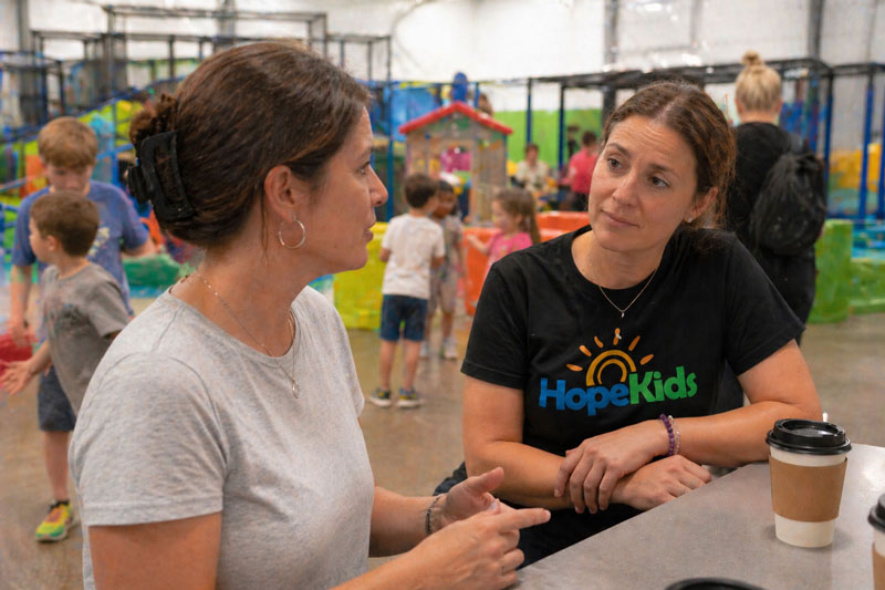 moms with sick child talking